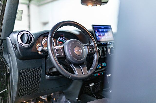 2016 Jeep Wrangler 4x4 Sahara Red Deer AB