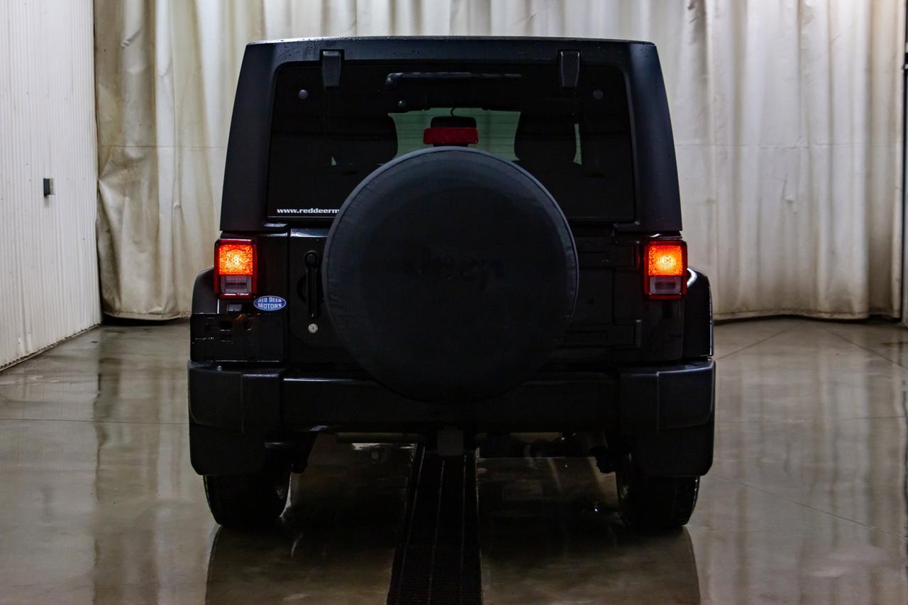 2016 Jeep Wrangler Unlimited 4x4 Sahara Manual Nav Red Deer AB