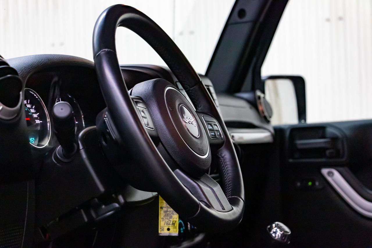 2016 Jeep Wrangler Unlimited 4x4 Sahara Manual Nav Red Deer AB