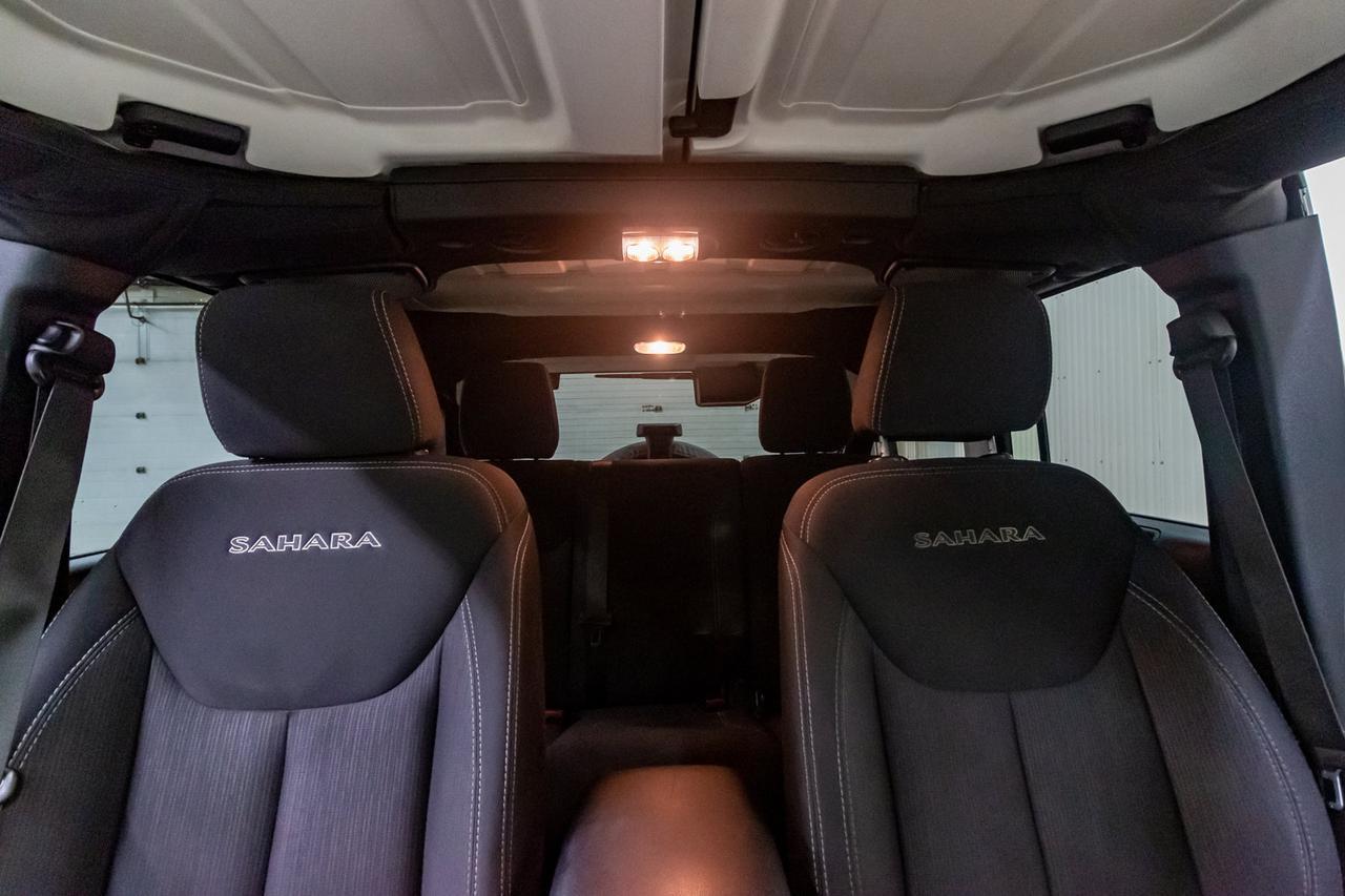 2016 Jeep Wrangler Unlimited 4x4 Sahara Manual Nav Red Deer AB
