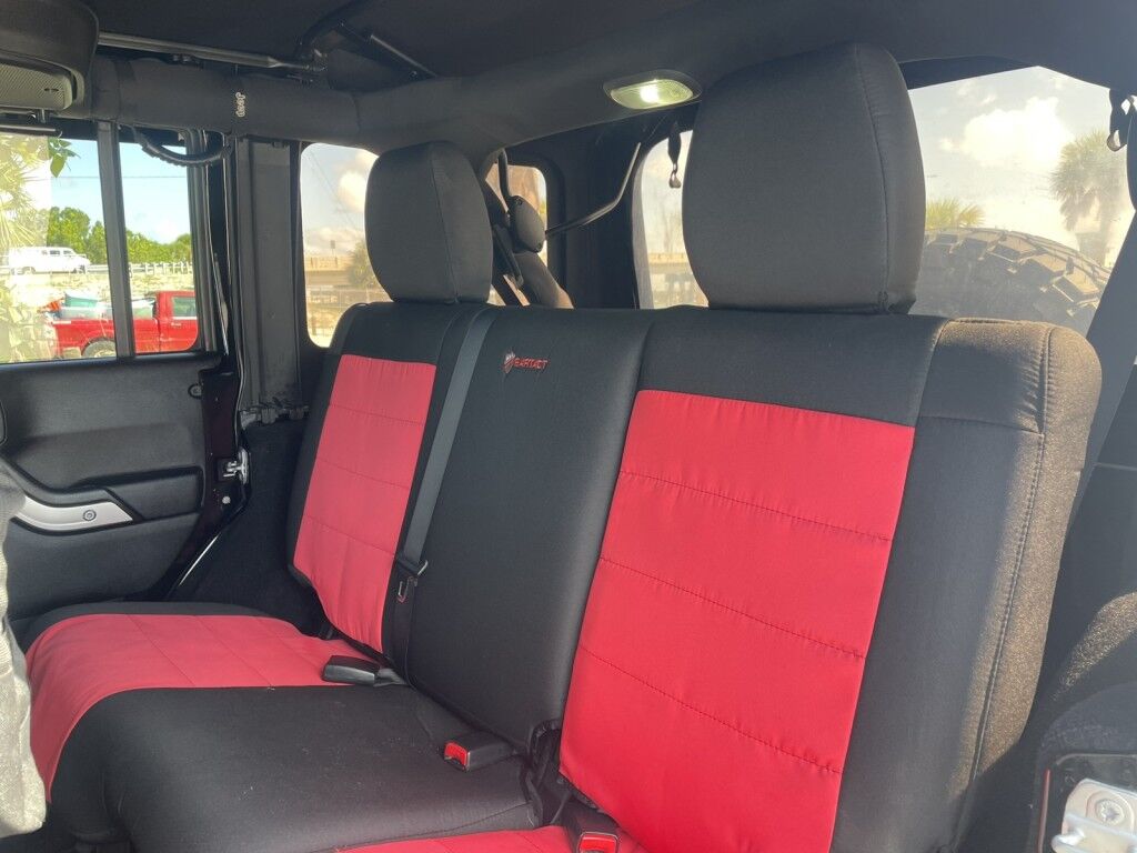 2016 Jeep Wrangler Unlimited Rubicon~LOW MILES~WINCH~LED LIGHTS ALL OVER~4X4~ALLOY SHIFT KNOB~BLUETOOTH~CRUISE CONTROL~FULL SIZE SPARE TIRE~HEATED SEATS~PREMIUM SOUND SYSTEM~REMOTE ENGINE START~REMOVABLE ROOF~TOW HOOKS Sarasota FL