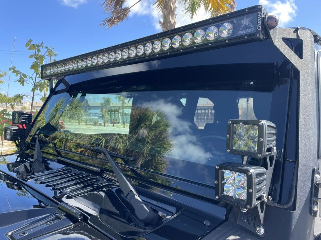 2016 Jeep Wrangler Unlimited Rubicon~LOW MILES~WINCH~LED LIGHTS ALL OVER~4X4~ALLOY SHIFT KNOB~BLUETOOTH~CRUISE CONTROL~FULL SIZE SPARE TIRE~HEATED SEATS~PREMIUM SOUND SYSTEM~REMOTE ENGINE START~REMOVABLE ROOF~TOW HOOKS Sarasota FL