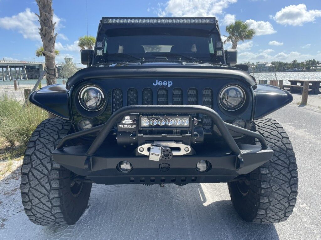 2016 Jeep Wrangler Unlimited Rubicon~LOW MILES~WINCH~LED LIGHTS ALL OVER~4X4~ALLOY SHIFT KNOB~BLUETOOTH~CRUISE CONTROL~FULL SIZE SPARE TIRE~HEATED SEATS~PREMIUM SOUND SYSTEM~REMOTE ENGINE START~REMOVABLE ROOF~TOW HOOKS Sarasota FL