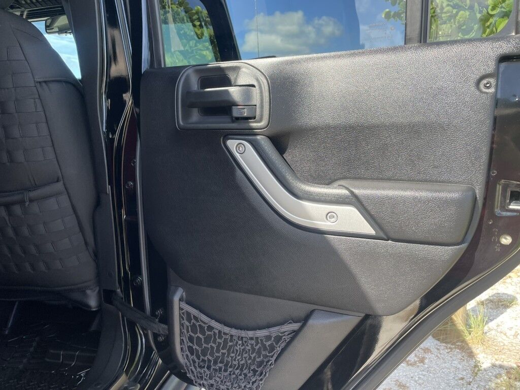2016 Jeep Wrangler Unlimited Rubicon~LOW MILES~WINCH~LED LIGHTS ALL OVER~4X4~ALLOY SHIFT KNOB~BLUETOOTH~CRUISE CONTROL~FULL SIZE SPARE TIRE~HEATED SEATS~PREMIUM SOUND SYSTEM~REMOTE ENGINE START~REMOVABLE ROOF~TOW HOOKS Sarasota FL