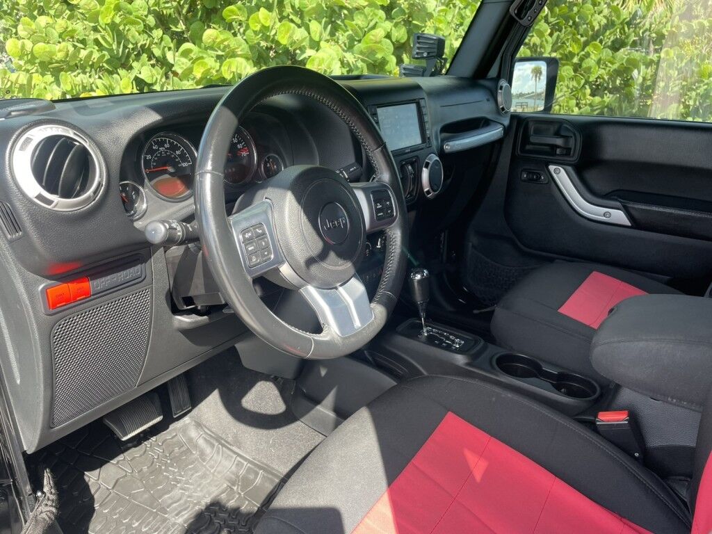 2016 Jeep Wrangler Unlimited Rubicon~LOW MILES~WINCH~LED LIGHTS ALL OVER~4X4~ALLOY SHIFT KNOB~BLUETOOTH~CRUISE CONTROL~FULL SIZE SPARE TIRE~HEATED SEATS~PREMIUM SOUND SYSTEM~REMOTE ENGINE START~REMOVABLE ROOF~TOW HOOKS Sarasota FL