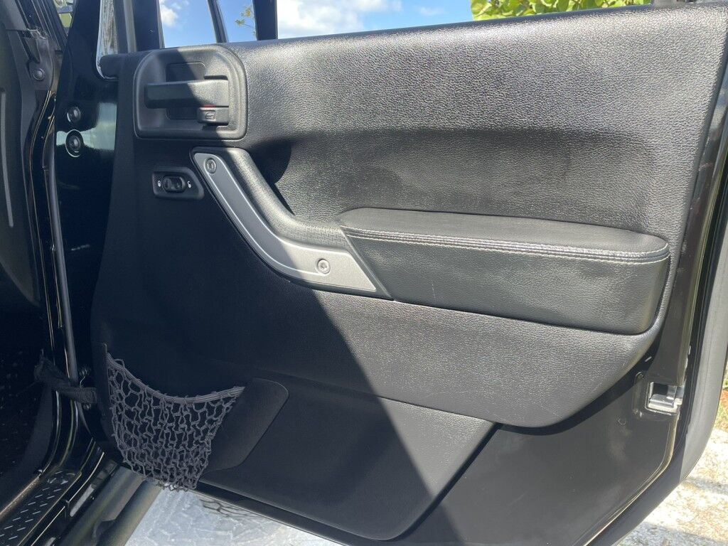 2016 Jeep Wrangler Unlimited Rubicon~LOW MILES~WINCH~LED LIGHTS ALL OVER~4X4~ALLOY SHIFT KNOB~BLUETOOTH~CRUISE CONTROL~FULL SIZE SPARE TIRE~HEATED SEATS~PREMIUM SOUND SYSTEM~REMOTE ENGINE START~REMOVABLE ROOF~TOW HOOKS Sarasota FL