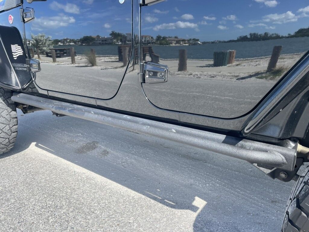 2016 Jeep Wrangler Unlimited Rubicon~LOW MILES~WINCH~LED LIGHTS ALL OVER~4X4~ALLOY SHIFT KNOB~BLUETOOTH~CRUISE CONTROL~FULL SIZE SPARE TIRE~HEATED SEATS~PREMIUM SOUND SYSTEM~REMOTE ENGINE START~REMOVABLE ROOF~TOW HOOKS Sarasota FL