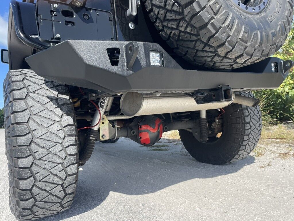 2016 Jeep Wrangler Unlimited Rubicon~LOW MILES~WINCH~LED LIGHTS ALL OVER~4X4~ALLOY SHIFT KNOB~BLUETOOTH~CRUISE CONTROL~FULL SIZE SPARE TIRE~HEATED SEATS~PREMIUM SOUND SYSTEM~REMOTE ENGINE START~REMOVABLE ROOF~TOW HOOKS Sarasota FL