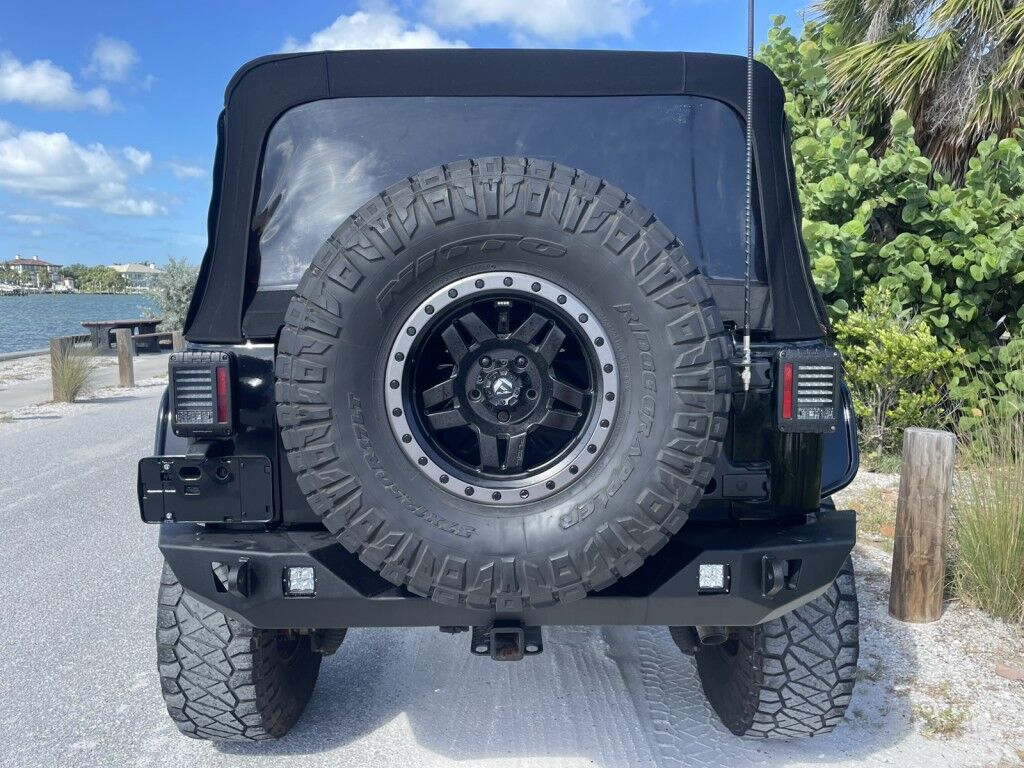 2016 Jeep Wrangler Unlimited Rubicon~LOW MILES~WINCH~LED LIGHTS ALL OVER~4X4~ALLOY SHIFT KNOB~BLUETOOTH~CRUISE CONTROL~FULL SIZE SPARE TIRE~HEATED SEATS~PREMIUM SOUND SYSTEM~REMOTE ENGINE START~REMOVABLE ROOF~TOW HOOKS Sarasota FL