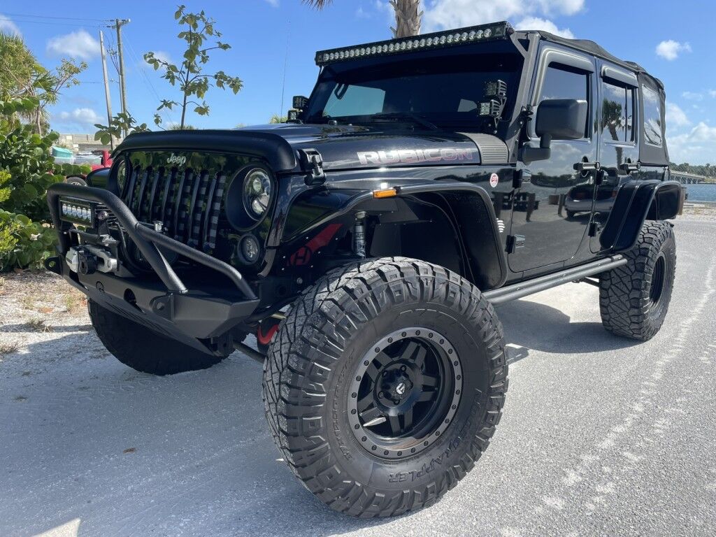 2016 Jeep Wrangler Unlimited Rubicon~LOW MILES~WINCH~LED LIGHTS ALL OVER~4X4~ALLOY SHIFT KNOB~BLUETOOTH~CRUISE CONTROL~FULL SIZE SPARE TIRE~HEATED SEATS~PREMIUM SOUND SYSTEM~REMOTE ENGINE START~REMOVABLE ROOF~TOW HOOKS Sarasota FL