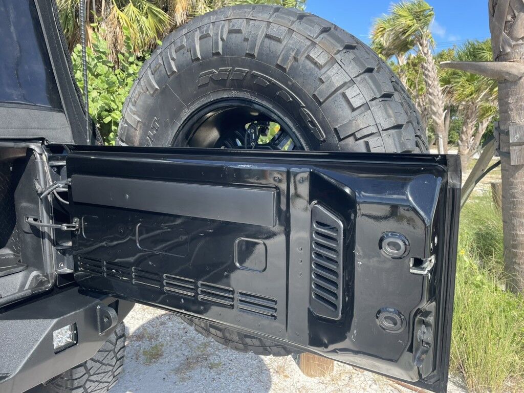 2016 Jeep Wrangler Unlimited Rubicon~LOW MILES~WINCH~LED LIGHTS ALL OVER~4X4~ALLOY SHIFT KNOB~BLUETOOTH~CRUISE CONTROL~FULL SIZE SPARE TIRE~HEATED SEATS~PREMIUM SOUND SYSTEM~REMOTE ENGINE START~REMOVABLE ROOF~TOW HOOKS Sarasota FL