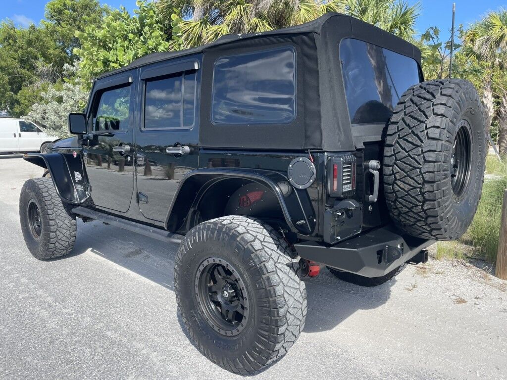 2016 Jeep Wrangler Unlimited Rubicon~LOW MILES~WINCH~LED LIGHTS ALL OVER~4X4~ALLOY SHIFT KNOB~BLUETOOTH~CRUISE CONTROL~FULL SIZE SPARE TIRE~HEATED SEATS~PREMIUM SOUND SYSTEM~REMOTE ENGINE START~REMOVABLE ROOF~TOW HOOKS Sarasota FL