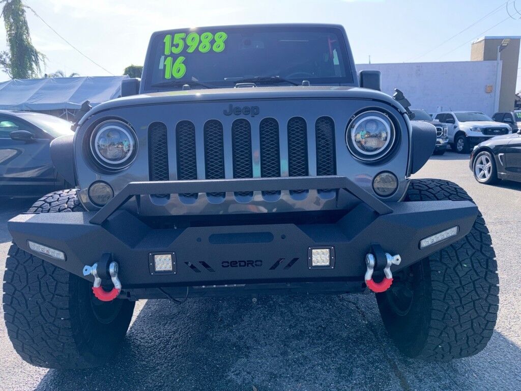 2016 Jeep Wrangler Unlimited SPORT~4X4~CLEAN CARFAX~ONLINE FINANCE AND SHIPPING AVAILABLE!!!!!