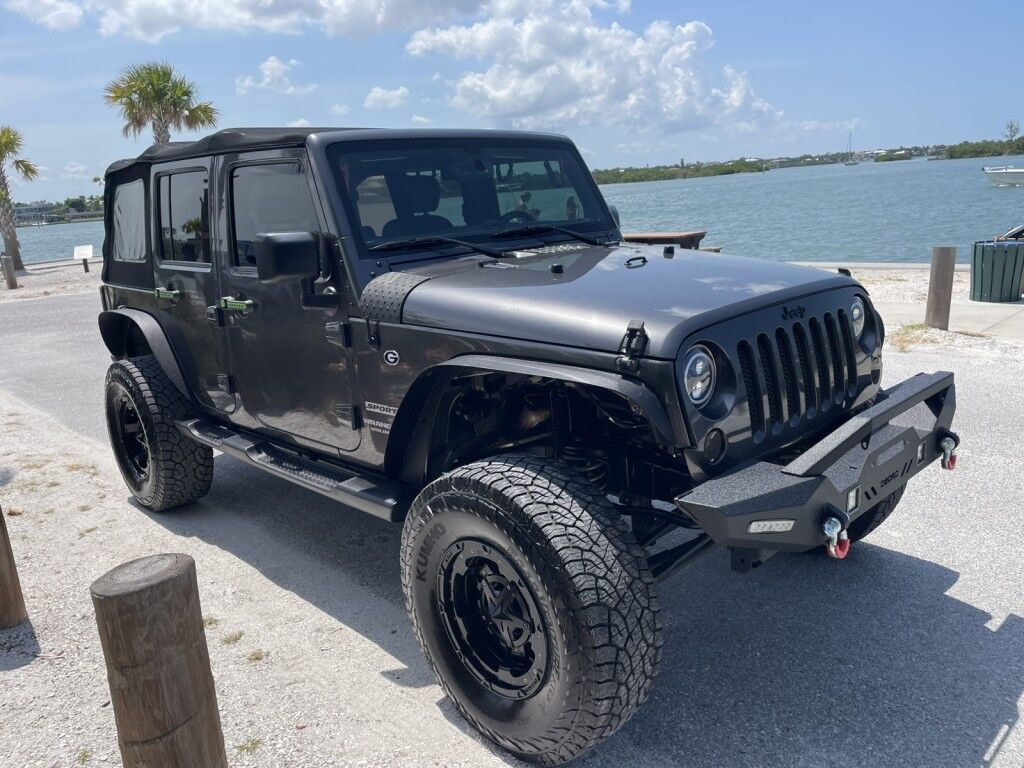 2016 Jeep Wrangler Unlimited SPORT~4X4~CLEAN CARFAX~ONLINE FINANCE AND SHIPPING AVAILABLE!!!! Sarasota FL