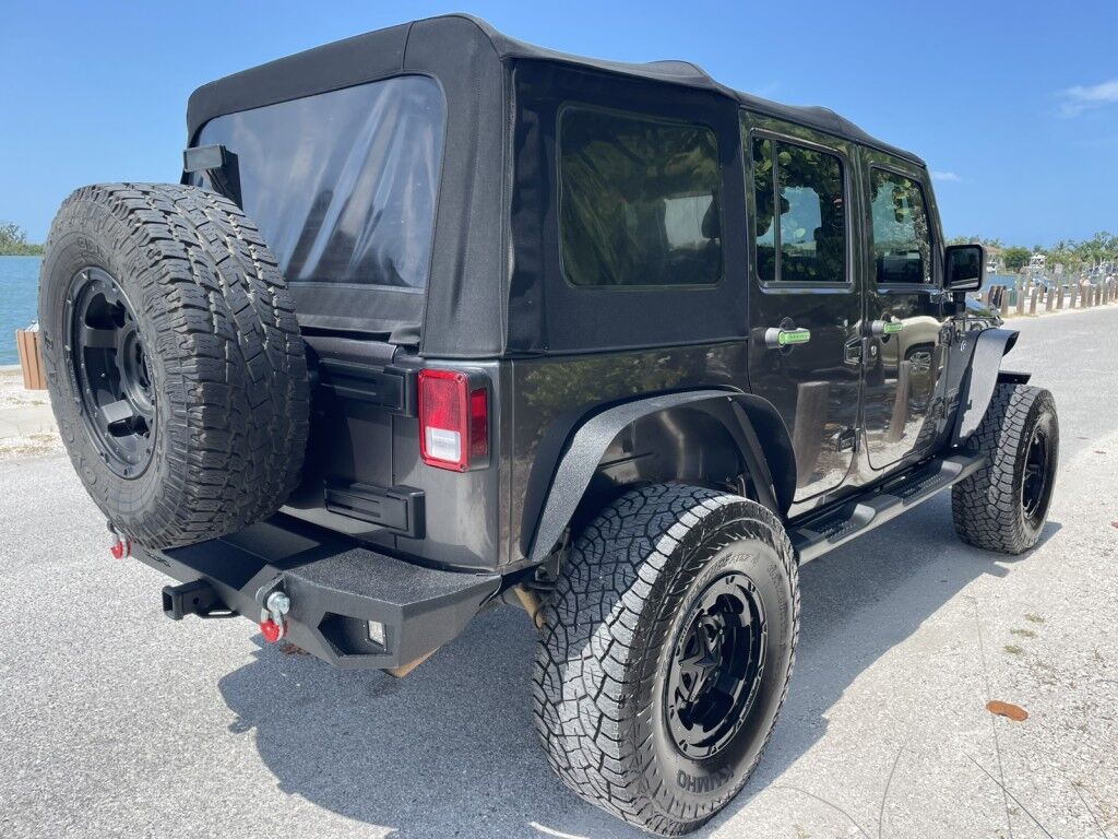 2016 Jeep Wrangler Unlimited SPORT~4X4~CLEAN CARFAX~ONLINE FINANCE AND SHIPPING AVAILABLE!!!! Sarasota FL
