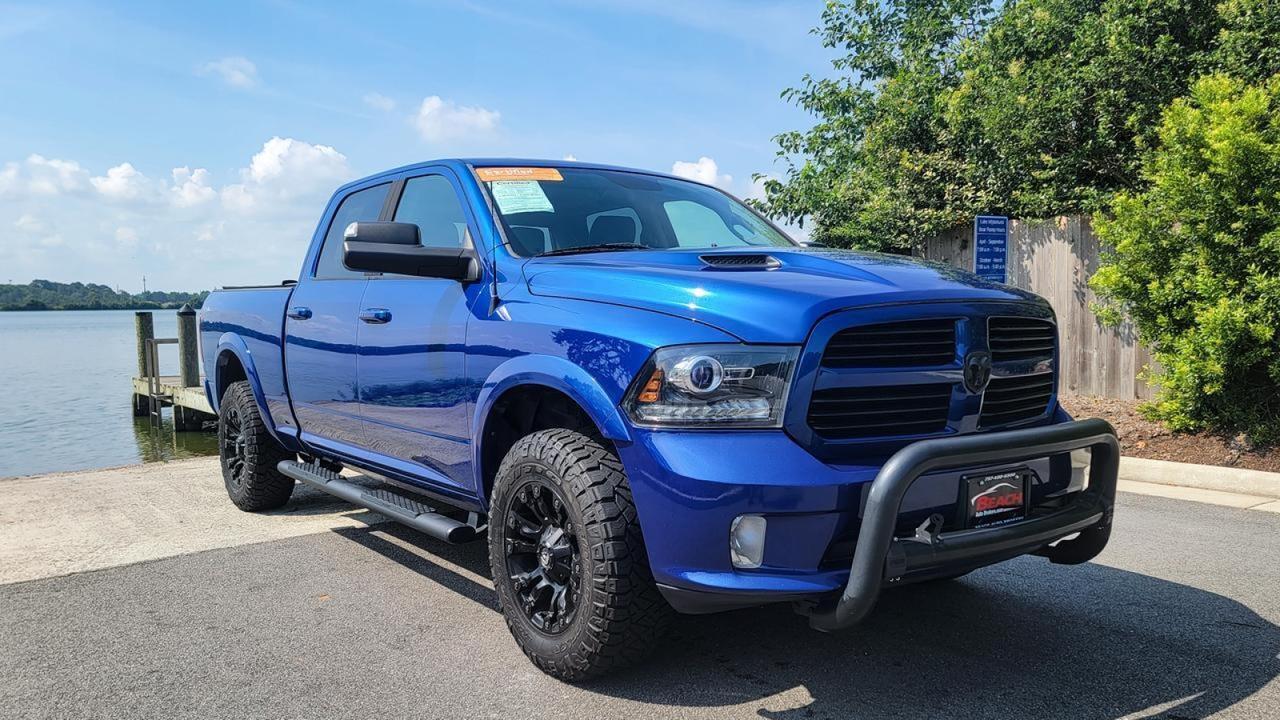 2016 Ram 1500 Sport 4x4 WITH CUSTOM RIMS, CUSTOM EXHAUST, RAIN SENSE
