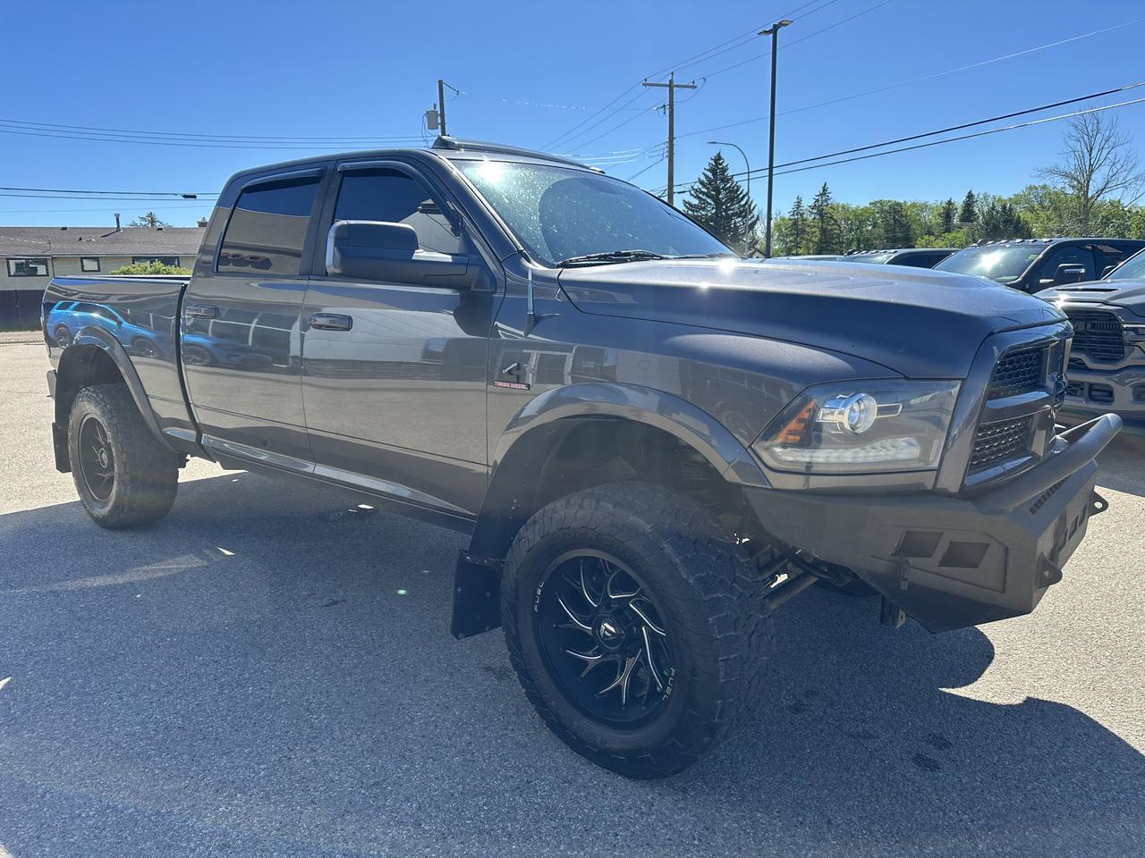 2016 Ram 2500 Laramie | RIG READY RAM | DELETED & TUNED | Lifted | Fuel Wheels | Aftermarket Bumpers | Loaded!! Redwater AB