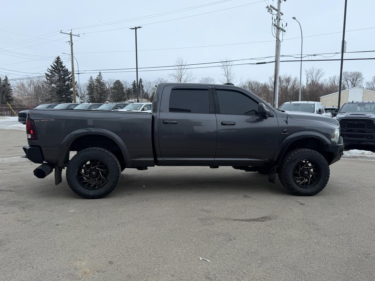 2016 Ram 2500 Laramie | RIG READY RAM | DELETED & TUNED | Lifted | Fuel Wheels | Aftermarket Bumpers | Loaded!! Redwater AB