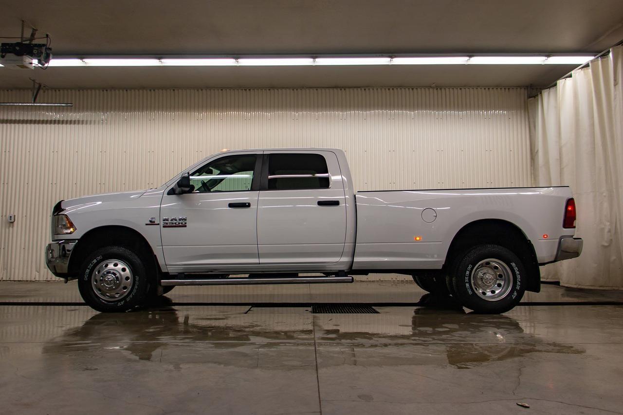 2016 Ram 3500 4x4 Crew Cab SLT Diesel Dually Red Deer AB