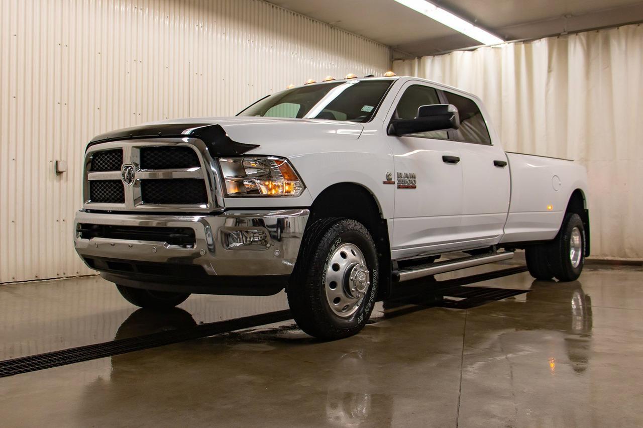2016 Ram 3500 4x4 Crew Cab SLT Diesel Dually Red Deer AB
