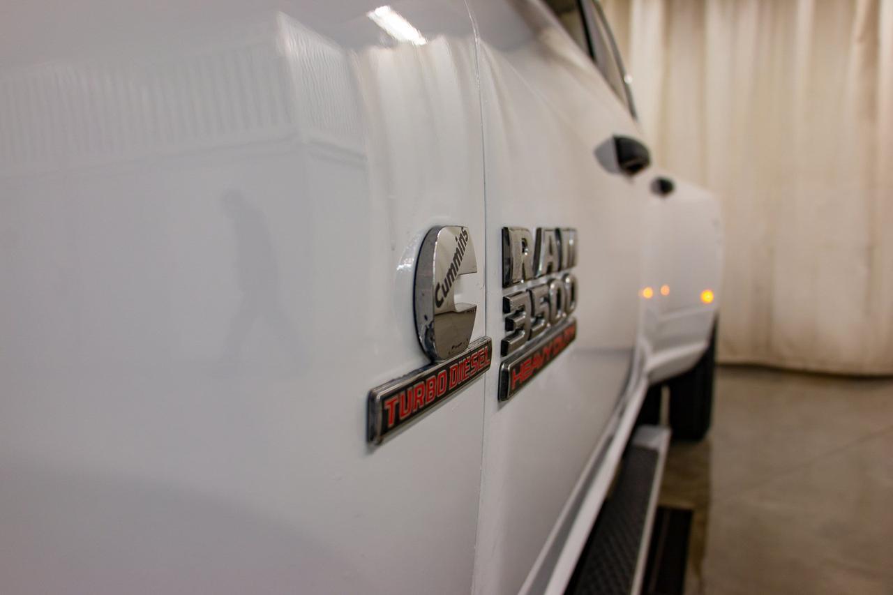 2016 Ram 3500 4x4 Crew Cab SLT Diesel Dually Red Deer AB
