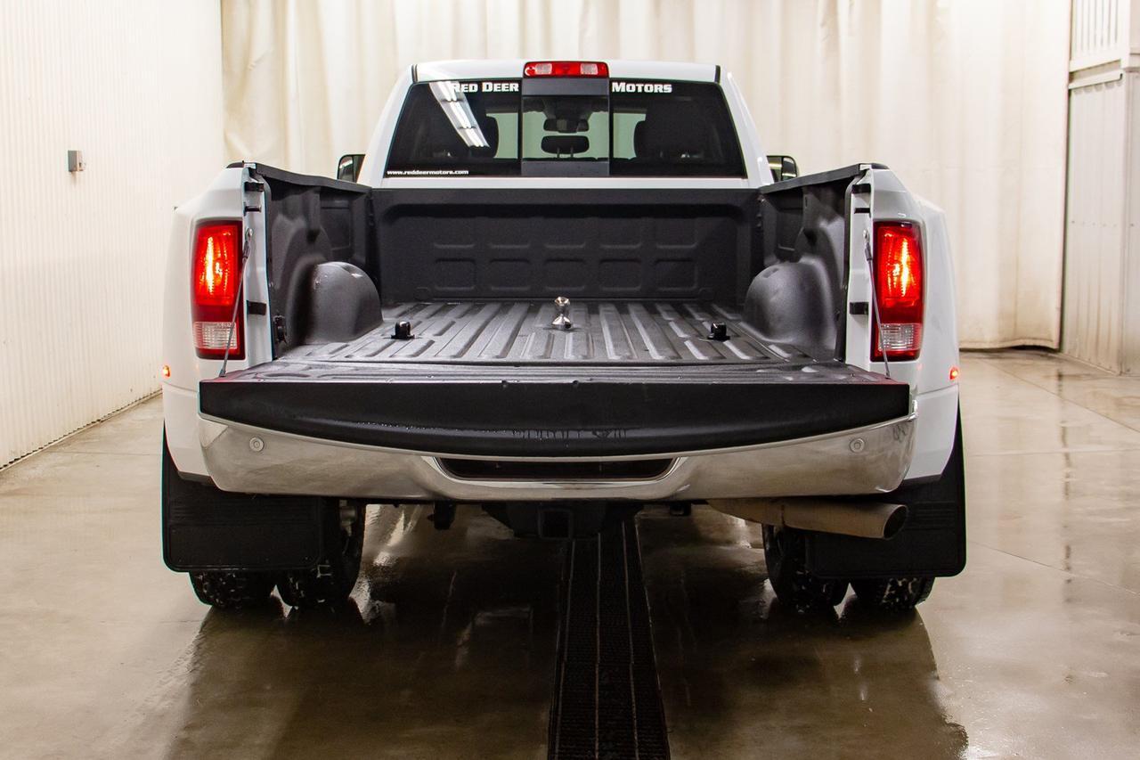 2016 Ram 3500 4x4 Crew Cab SLT Diesel Dually Red Deer AB