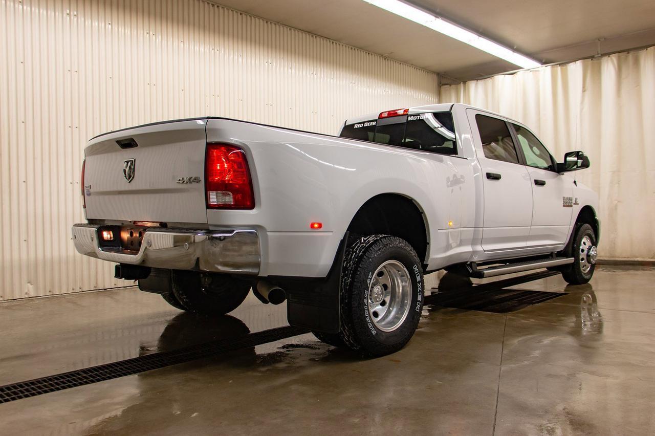 2016 Ram 3500 4x4 Crew Cab SLT Diesel Dually Red Deer AB