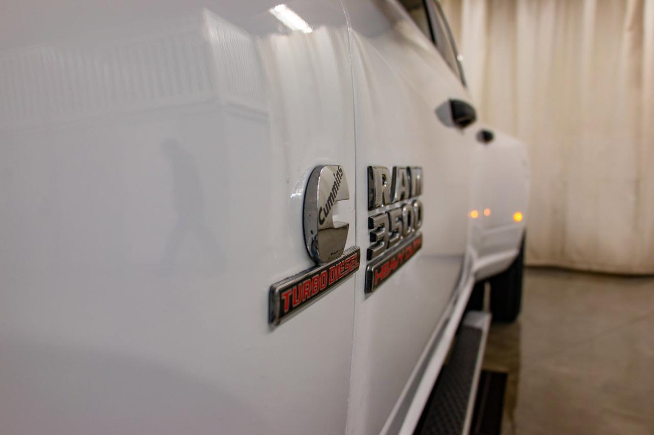 2016 Ram 3500 4x4 Crew Cab SLT Diesel Dually Red Deer AB