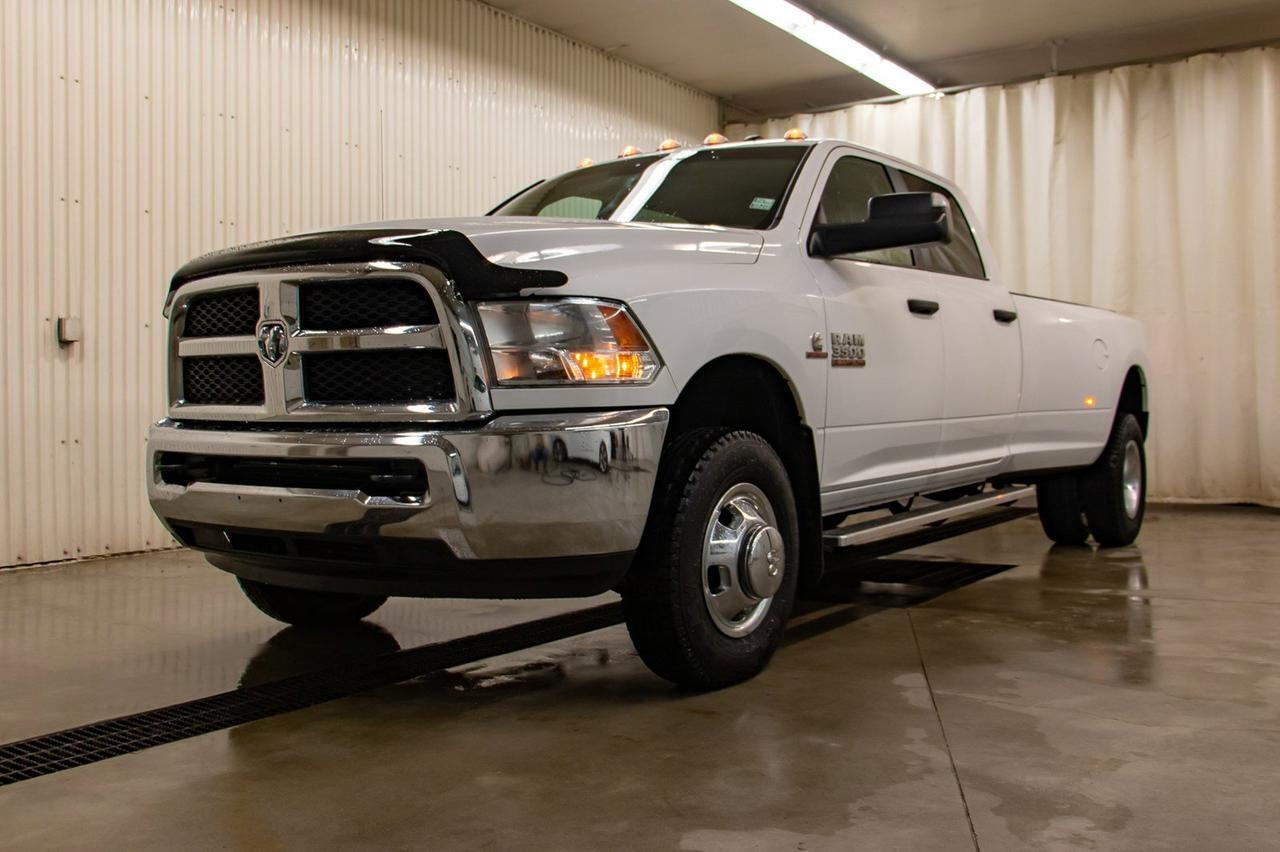 2016 Ram 3500 4x4 Crew Cab SLT Diesel Dually Red Deer AB