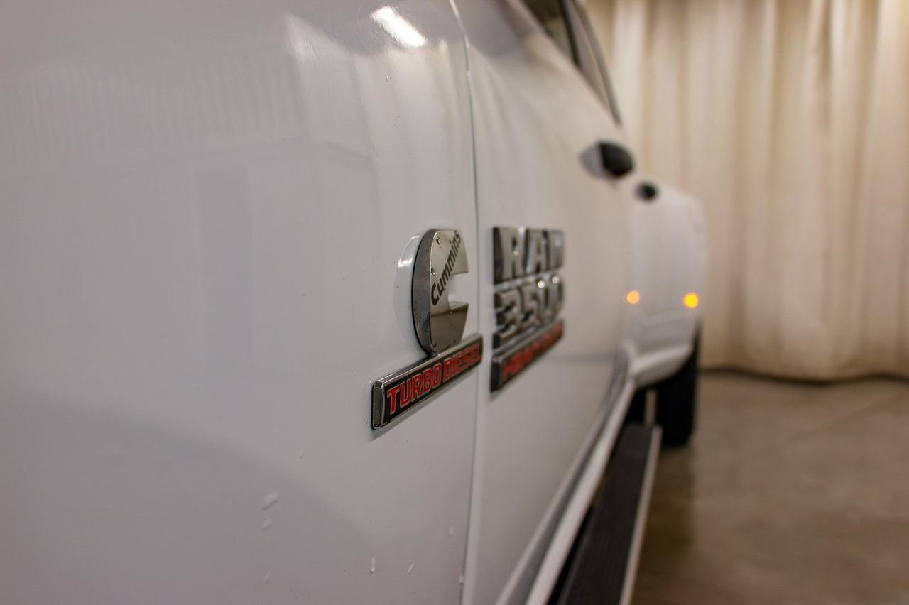 2016 Ram 3500 4x4 Crew Cab SLT Diesel Dually Red Deer AB