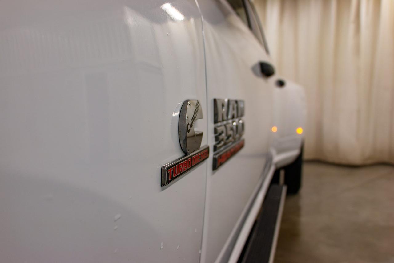 2016 Ram 3500 4x4 Crew Cab SLT Diesel Dually Red Deer AB