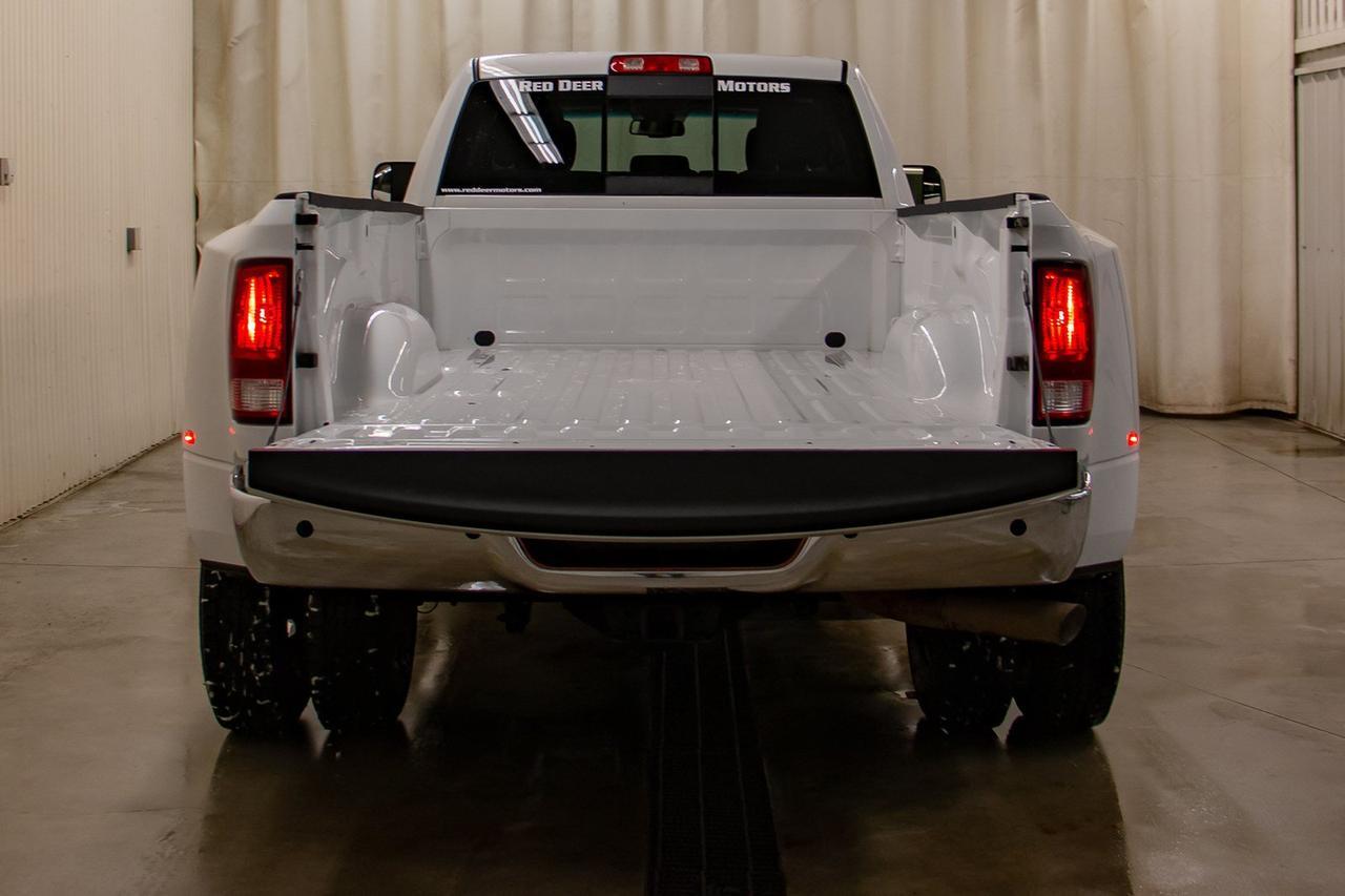 2016 Ram 3500 4x4 Crew Cab SLT Diesel Dually Red Deer AB