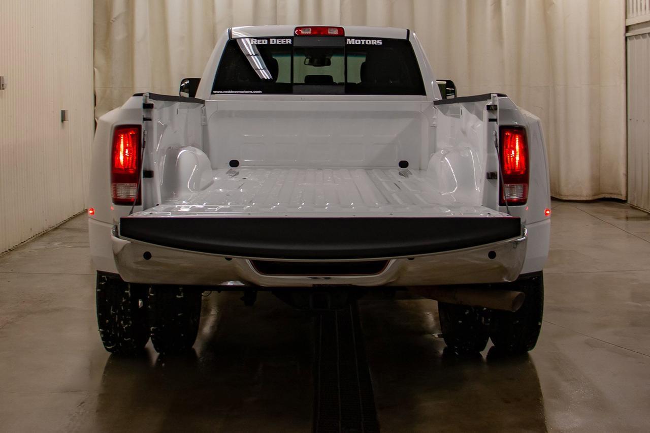 2016 Ram 3500 4x4 Crew Cab SLT Diesel Dually Red Deer AB