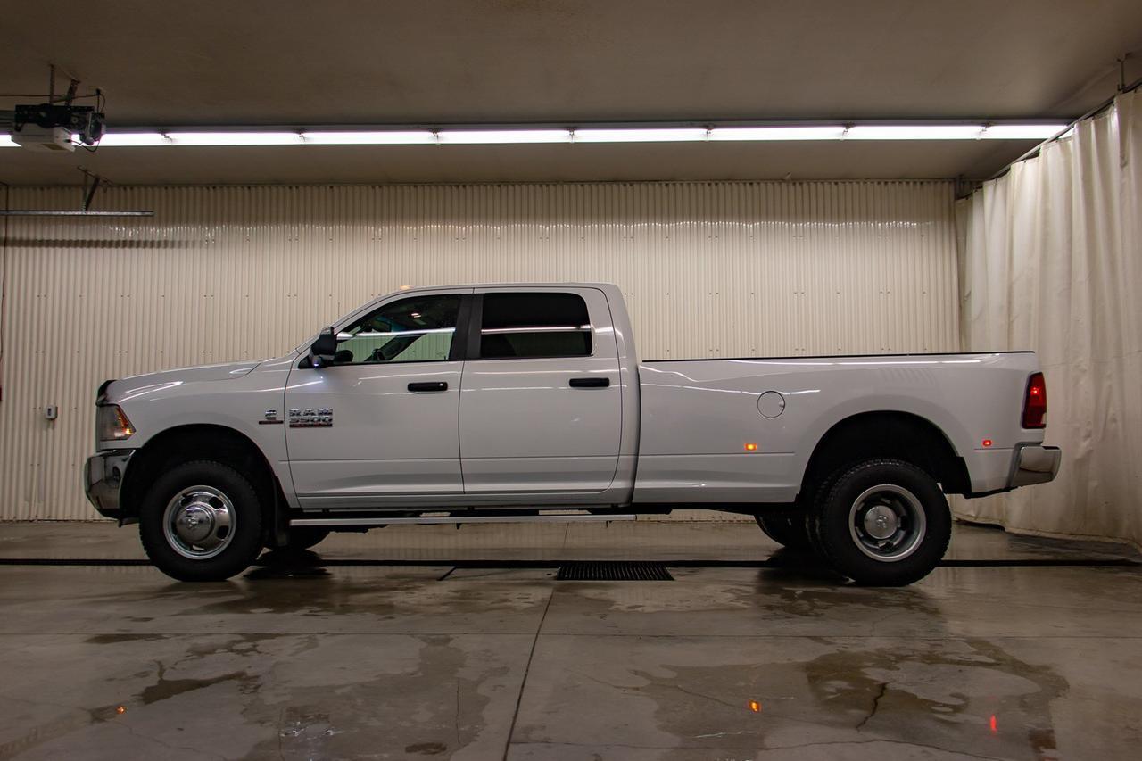 2016 Ram 3500 4x4 Crew Cab SLT Diesel Dually Red Deer AB