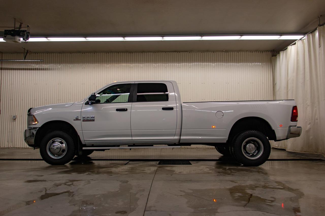 2016 Ram 3500 4x4 Crew Cab SLT Diesel Dually Red Deer AB