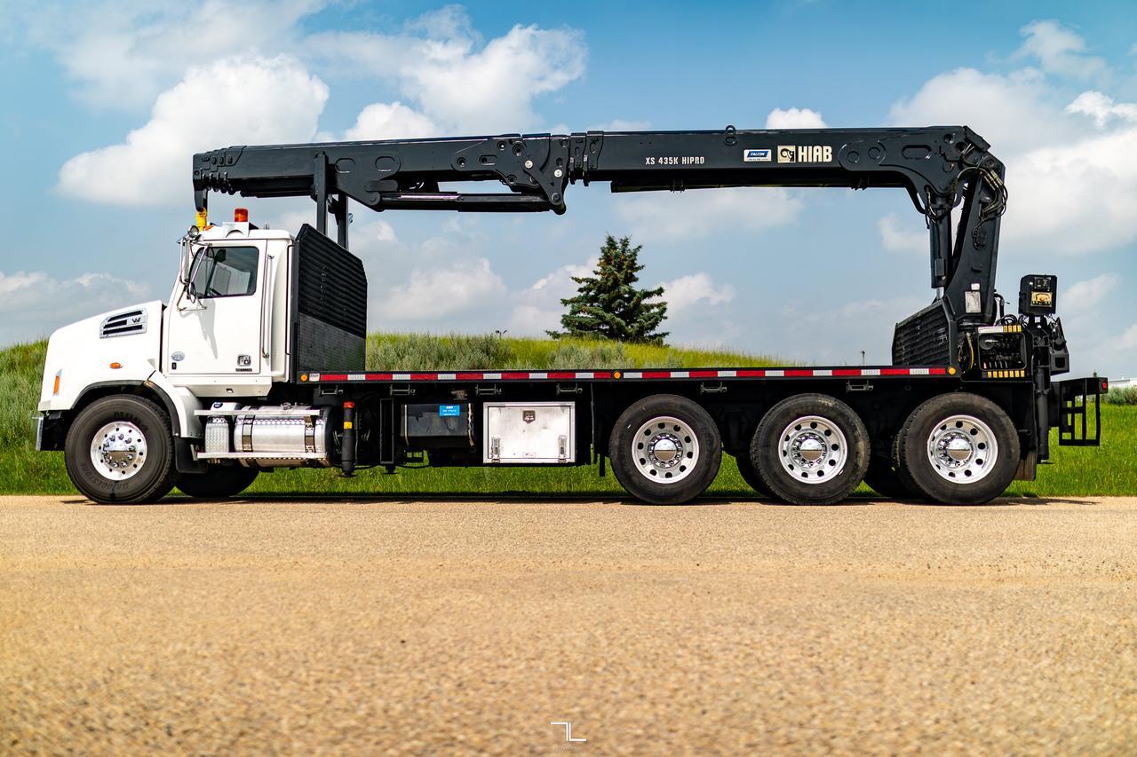2016 Western Star 4700 SB Daycab Tridrive Deck Picker Crane Diesel Red Deer AB