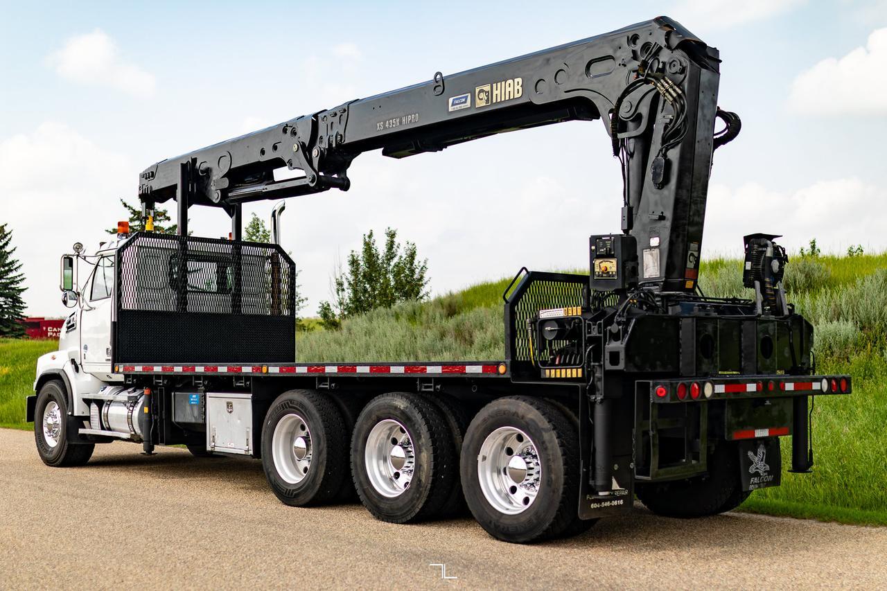 2016 Western Star 4700 SB Daycab Tridrive Deck Picker Crane Diesel Red Deer AB