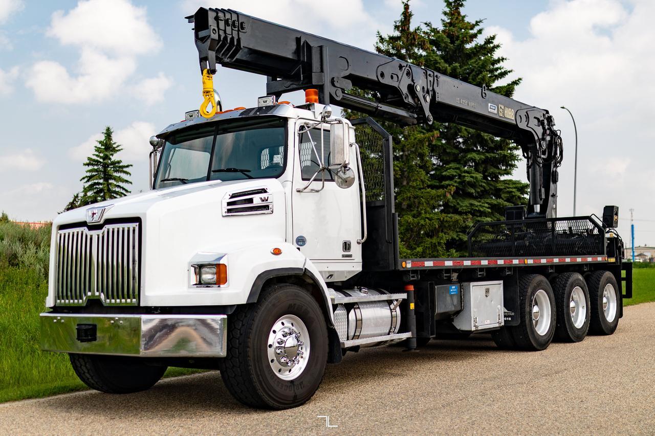 2016 Western Star 4700 SB Daycab Tridrive Deck Picker Crane Diesel Red Deer AB