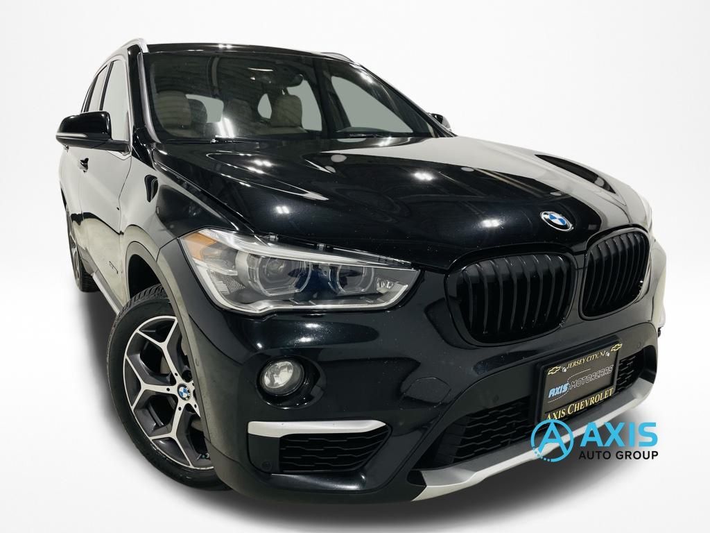 Used 2017 BMW X1 28i with VIN WBXHT3Z36H4A65700 for sale in Jersey City, NJ