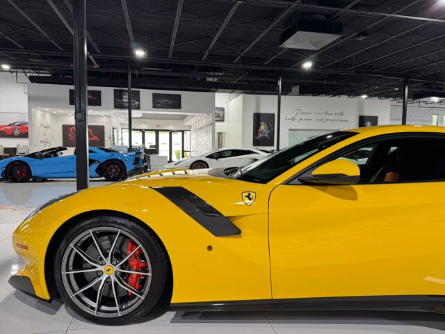 2017 Ferrari F12tdf Giallo Modena paint, painted stripes, carbon racing seats, loads of exterior/interior carbon Fort Lauderdale FL