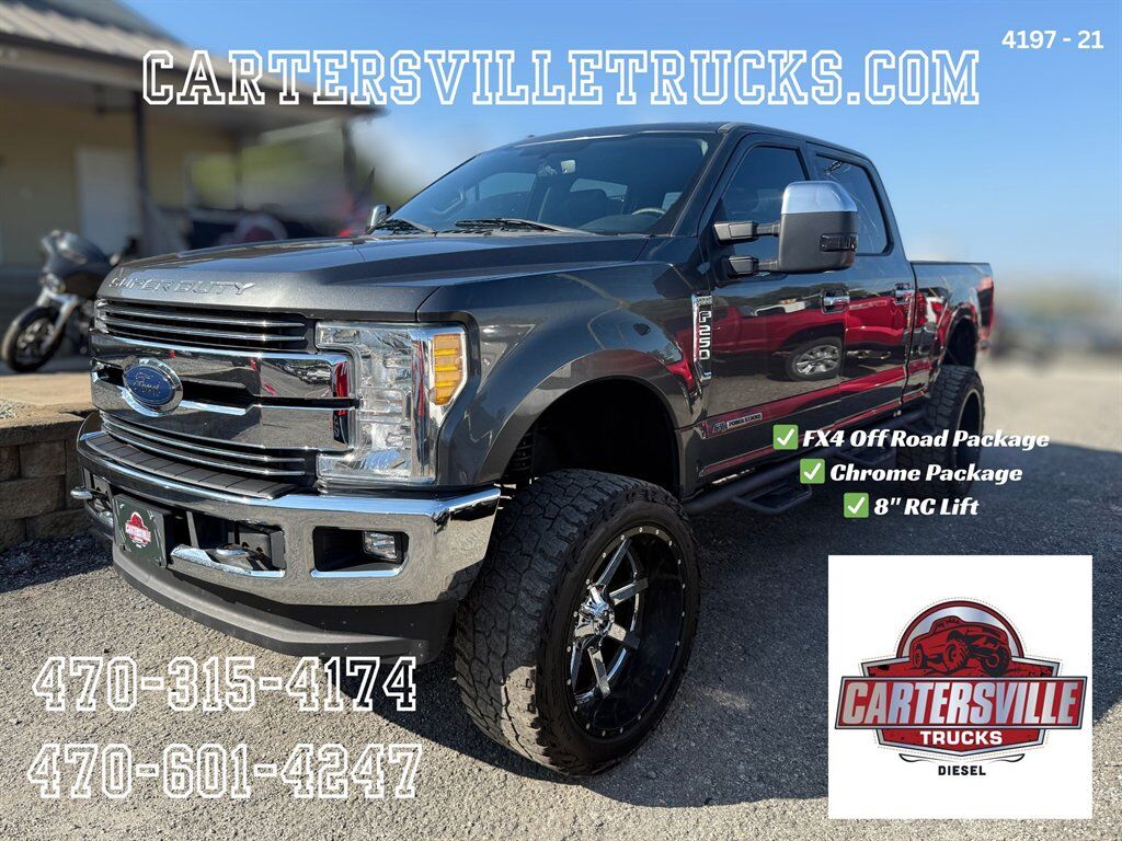 2017 Ford F250sd Lariat FX4 - 8" LIFT - 24's - CHROME PKG - BLIS