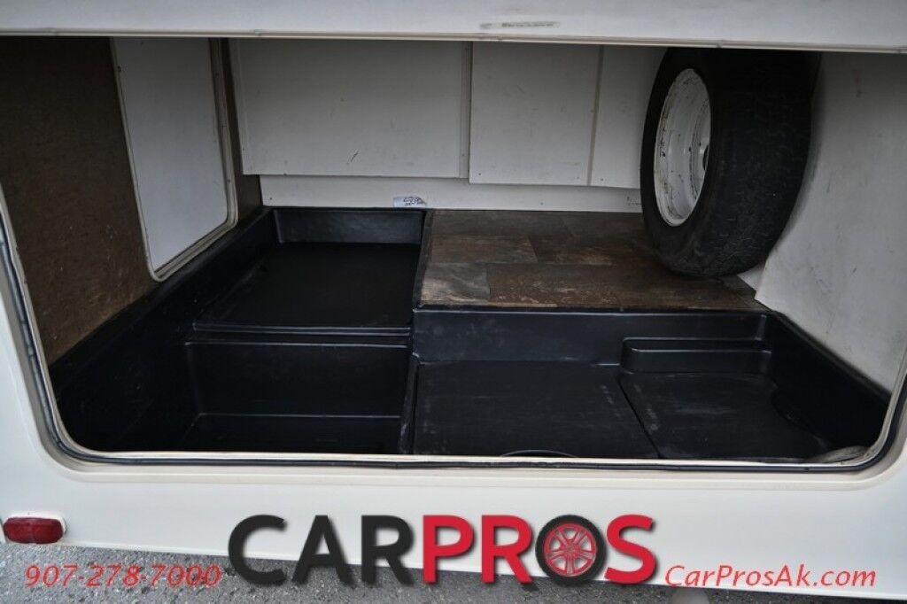 2017 Forest River Leprechaun M-230CB - 6.8L V10 Triton - 4.0 kW Onan Generator - 3 Burner Stove - Microwave - Refrigerator - Sleeps 7 - Power Awning - Bathroom w/ Shower - Queen Bed - Tow Package Anchorage AK