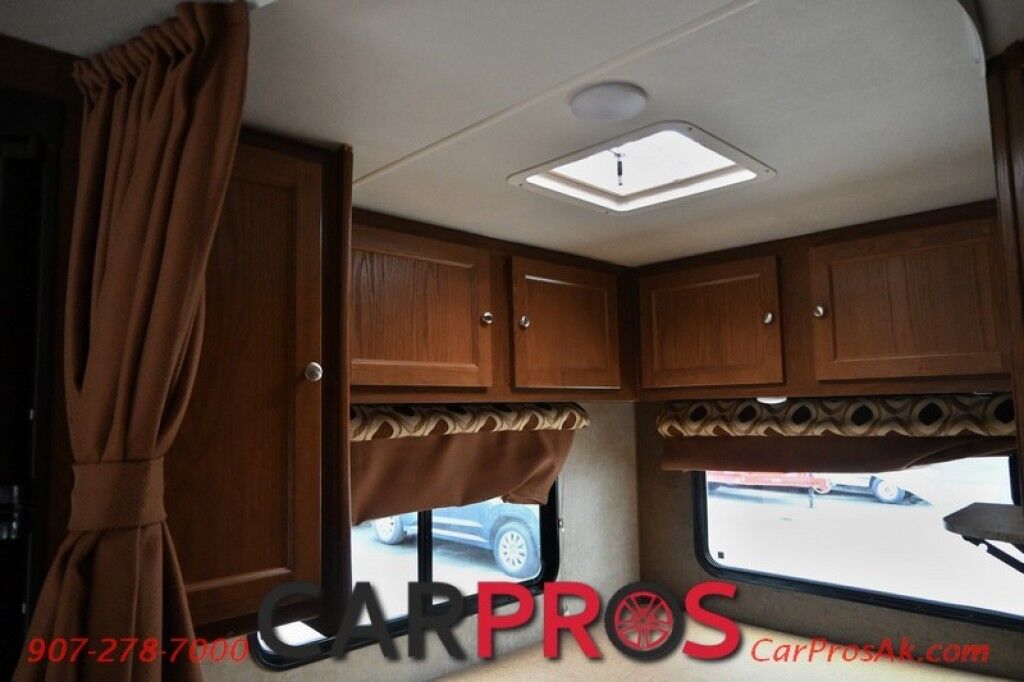 2017 Forest River Leprechaun M-230CB - 6.8L V10 Triton - 4.0 kW Onan Generator - 3 Burner Stove - Microwave - Refrigerator - Sleeps 7 - Power Awning - Bathroom w/ Shower - Queen Bed - Tow Package Anchorage AK