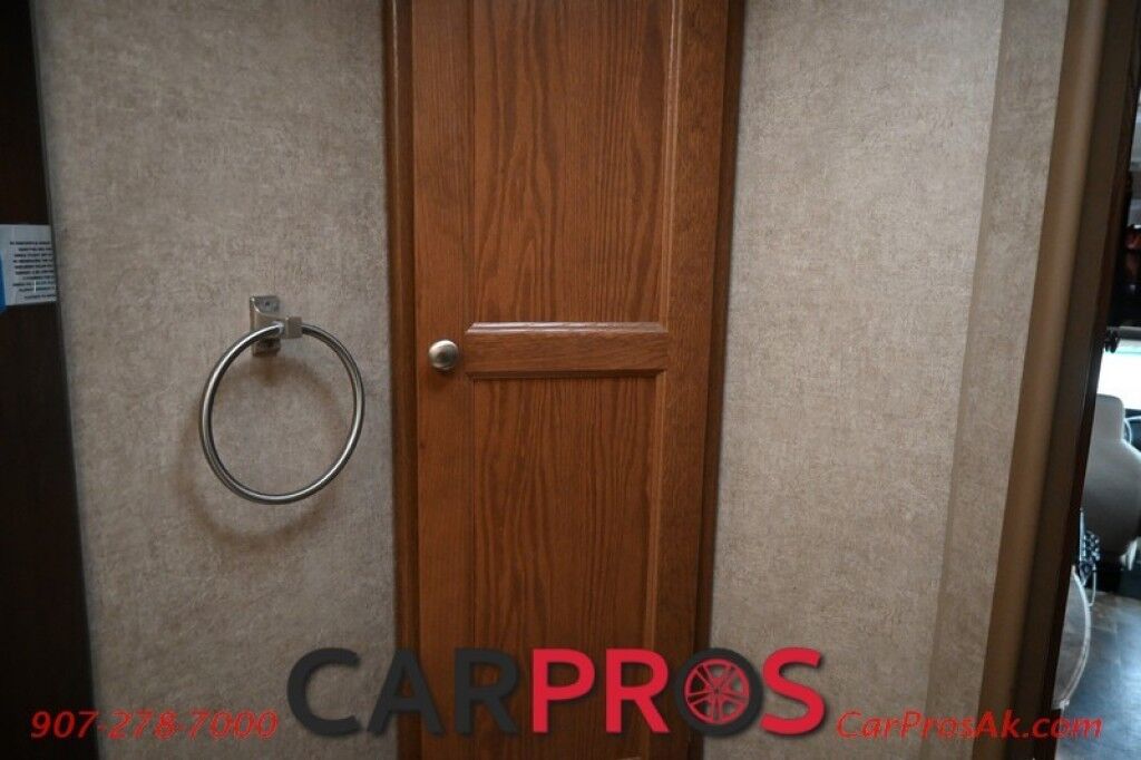 2017 Forest River Leprechaun M-230CB - 6.8L V10 Triton - 4.0 kW Onan Generator - 3 Burner Stove - Microwave - Refrigerator - Sleeps 7 - Power Awning - Bathroom w/ Shower - Queen Bed - Tow Package Anchorage AK