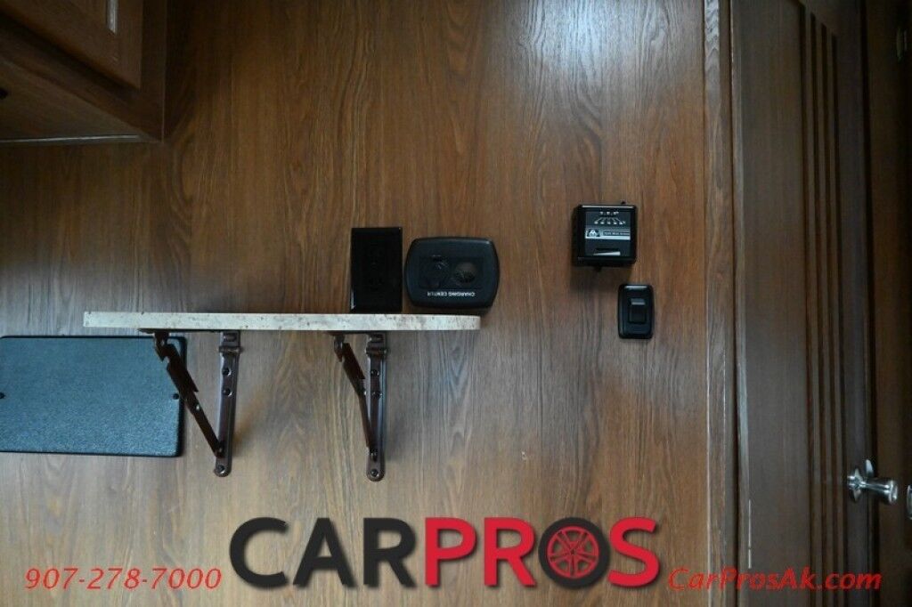 2017 Forest River Leprechaun M-230CB - 6.8L V10 Triton - 4.0 kW Onan Generator - 3 Burner Stove - Microwave - Refrigerator - Sleeps 7 - Power Awning - Bathroom w/ Shower - Queen Bed - Tow Package Anchorage AK