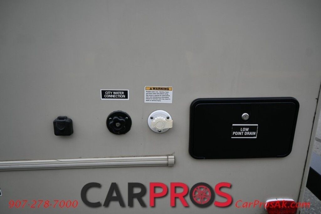 2017 Forest River Leprechaun M-230CB - 6.8L V10 Triton - 4.0 kW Onan Generator - 3 Burner Stove - Microwave - Refrigerator - Sleeps 7 - Power Awning - Bathroom w/ Shower - Queen Bed - Tow Package Anchorage AK