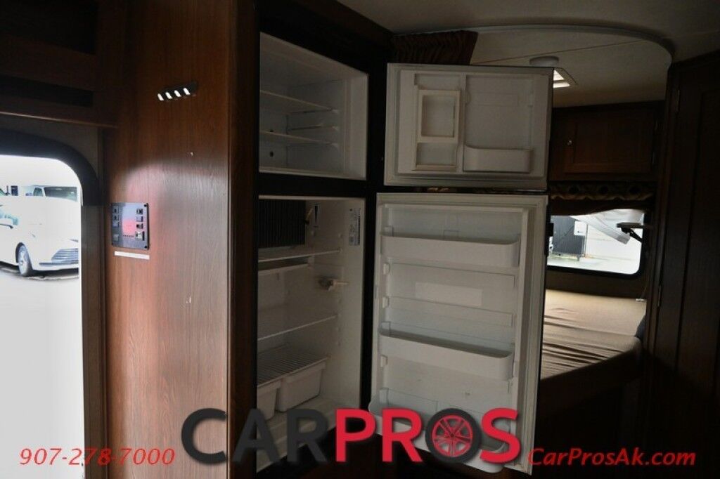 2017 Forest River Leprechaun M-230CB - 6.8L V10 Triton - 4.0 kW Onan Generator - 3 Burner Stove - Microwave - Refrigerator - Sleeps 7 - Power Awning - Bathroom w/ Shower - Queen Bed - Tow Package Anchorage AK