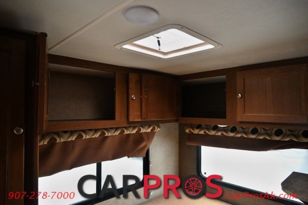 2017 Forest River Leprechaun M-230CB - 6.8L V10 Triton - 4.0 kW Onan Generator - 3 Burner Stove - Microwave - Refrigerator - Sleeps 7 - Power Awning - Bathroom w/ Shower - Queen Bed - Tow Package Anchorage AK