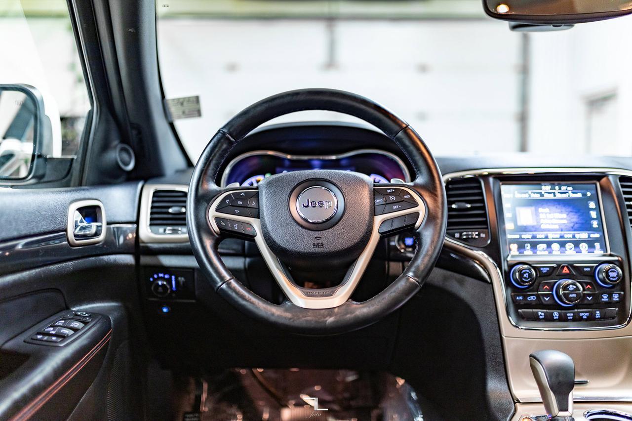 2017 Jeep Grand Cherokee 4x4 Laredo 75th Anniversary Nav Roof BCam Red Deer AB