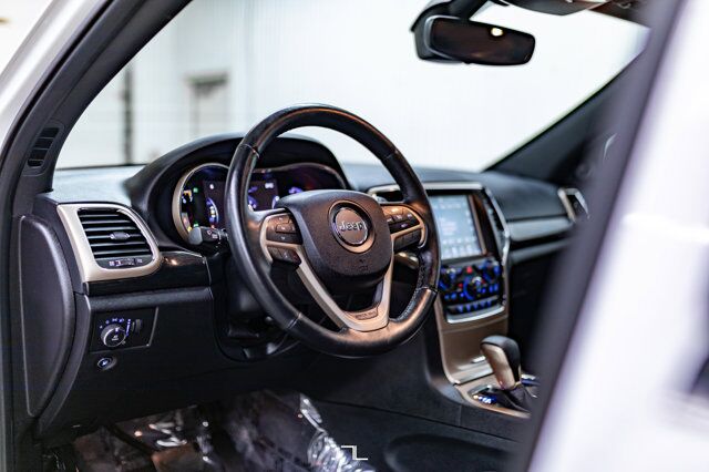 2017 Jeep Grand Cherokee 4x4 Laredo 75th Anniversary Nav Roof BCam Red Deer AB